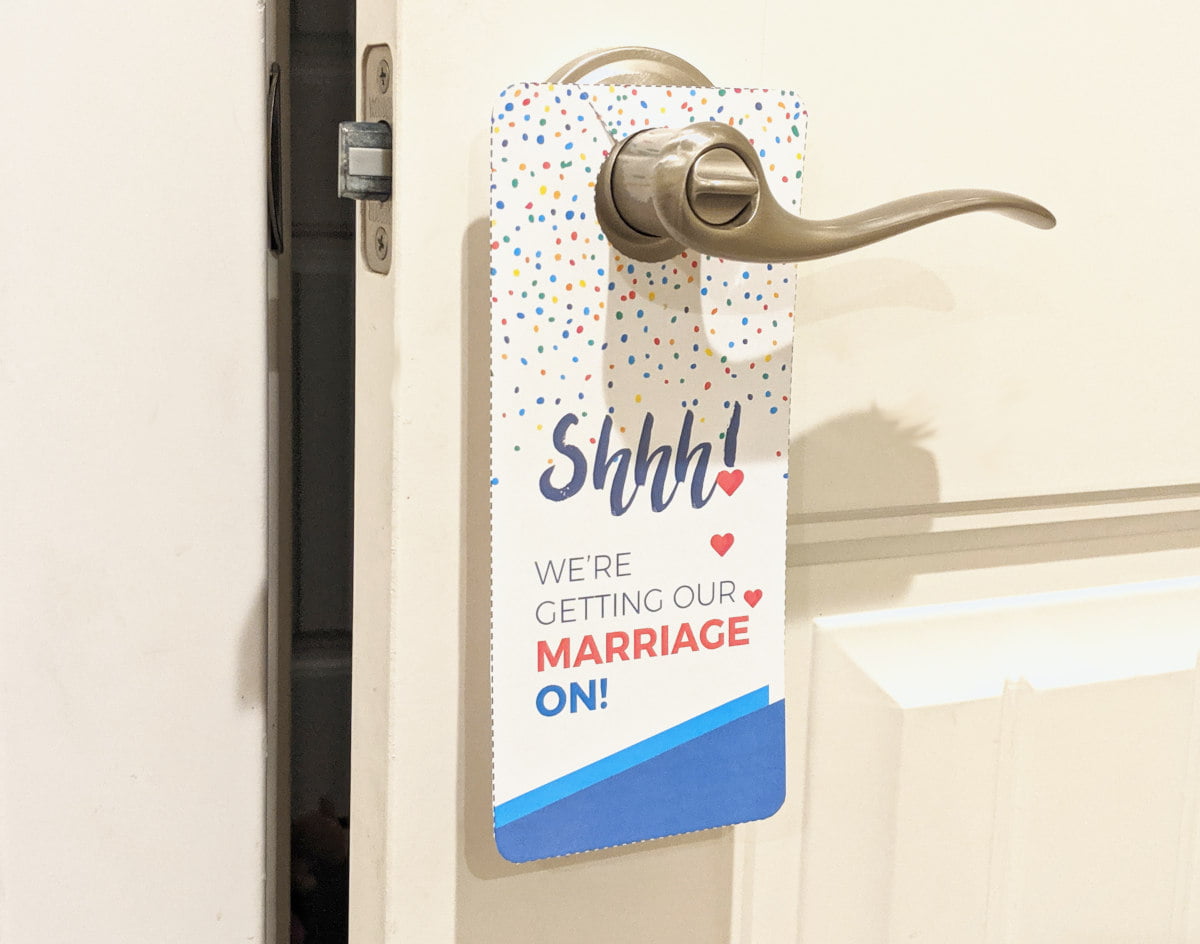 Shhh! We're getting our marriage on! door hanger
