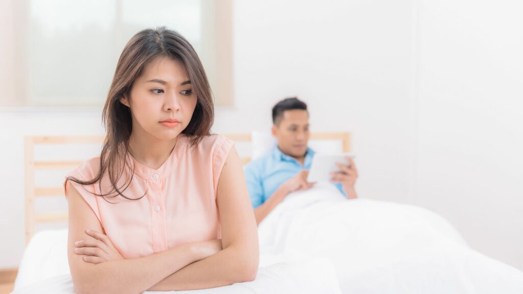 woman feeling anxious about her husband's lack of interest
